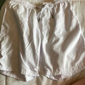 Mens Relleciga swim trunks! Size large, brand new with tags :)